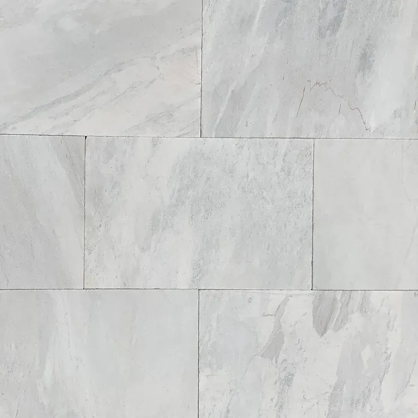 Gray and white stone tiles arranged in a rectangular pattern — Premier Bricks, Blocks & Pavers In Heatherbrae, NSW