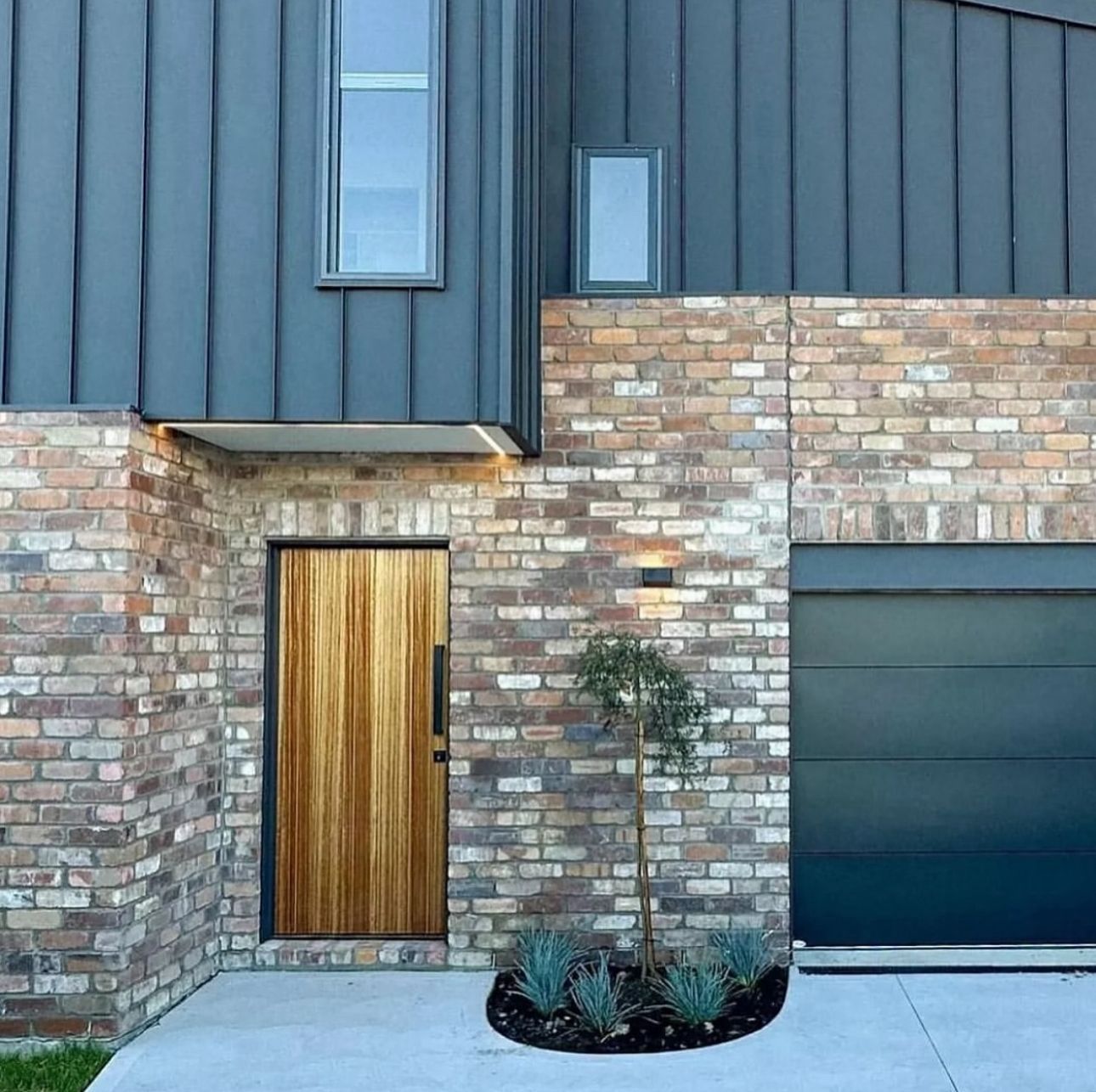 A facebrick entrance to a modern home — Premier Bricks, Blocks & Pavers In Heatherbrae, NSW
