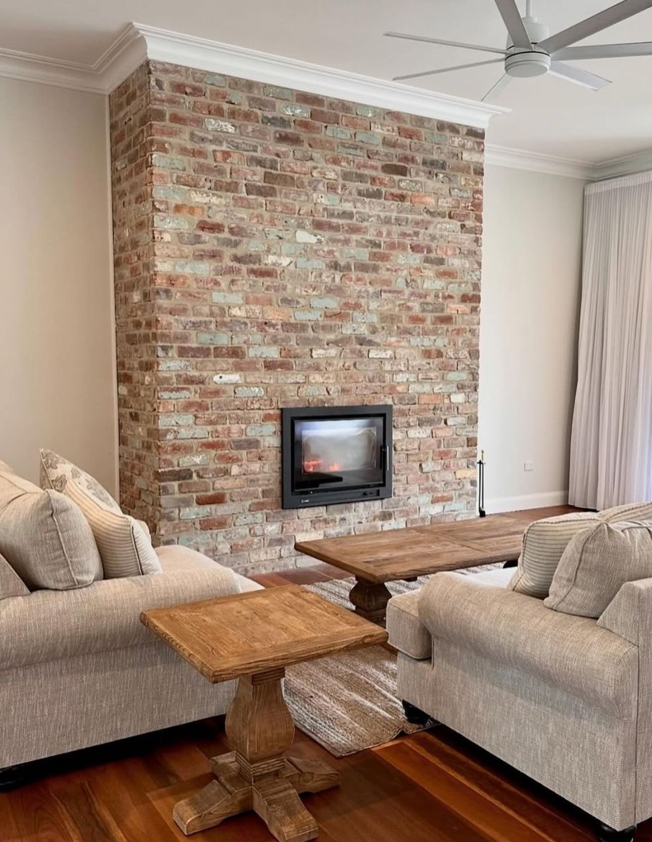 A brick walkway leading to a patio with a fence in the background — Premier Bricks, Blocks & Pavers In Heatherbrae, NSW