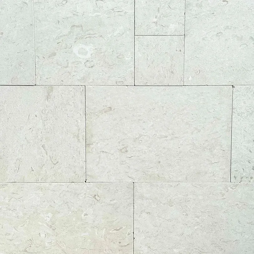 Light gray rectangular stone tiles arranged in a stacked pattern — Premier Bricks, Blocks & Pavers In Heatherbrae, NSW