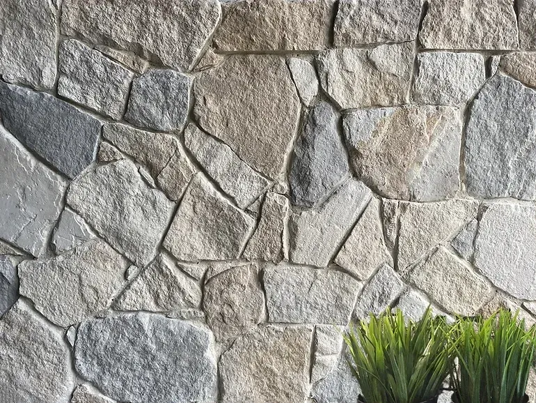 Stone wall with various shades of gray and tan — Premier Bricks, Blocks & Pavers In Heatherbrae, NSW