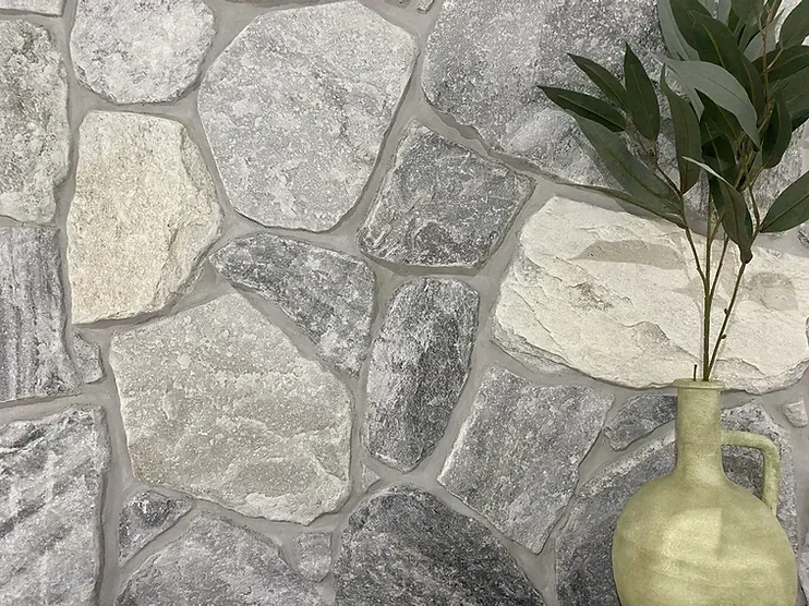 Stone wall with gray and white stones — Premier Bricks, Blocks & Pavers In Heatherbrae, NSW