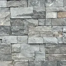 Gray and charcoal stacked stone wall with varied rectangular blocks — Premier Bricks, Blocks & Pavers In Heatherbrae, NSW