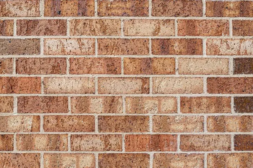 Brown brick wall with light mortar — Premier Bricks, Blocks & Pavers In Heatherbrae, NSW