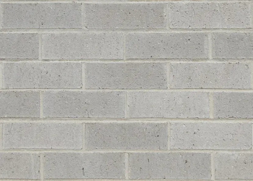 Light gray brick wall with off-white mortar — Premier Bricks, Blocks & Pavers In Heatherbrae, NSW