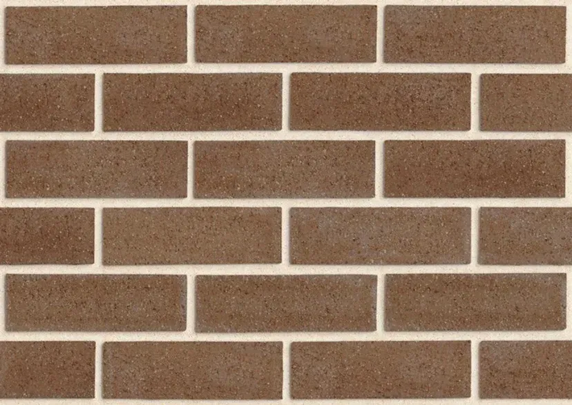 Brown brick wall with cream-colored mortar in a running bond pattern — Premier Bricks, Blocks & Pavers In Heatherbrae, NSW