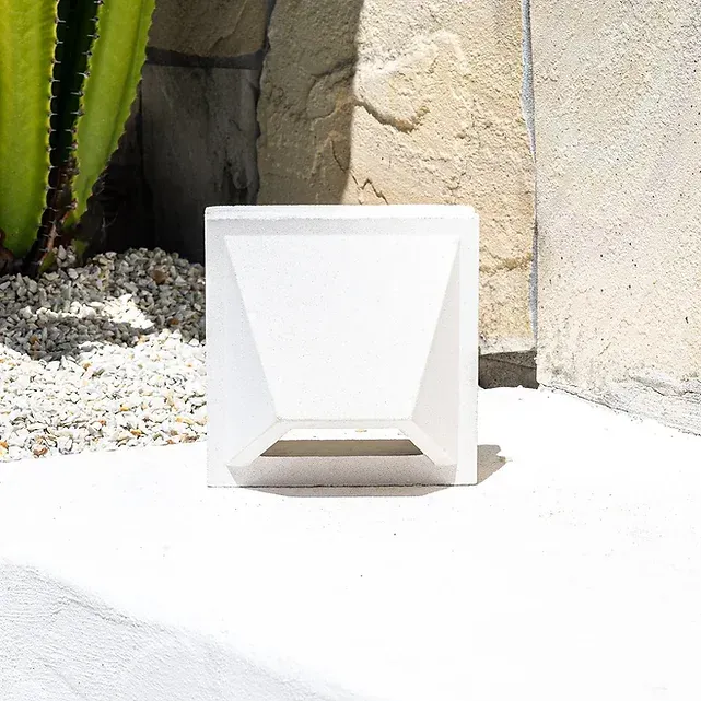 White geometric planter on a white surface — Premier Bricks, Blocks & Pavers In Heatherbrae, NSW