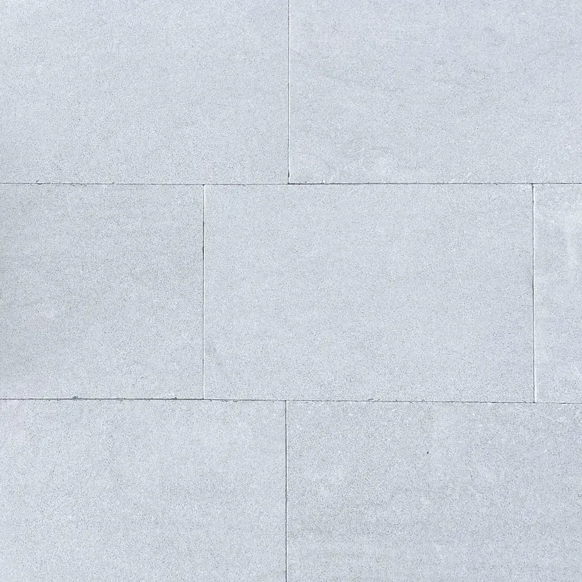 Light blue rectangular stone tiles arranged in a brick pattern — Premier Bricks, Blocks & Pavers In Heatherbrae, NSW