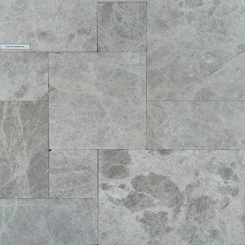 Gray marble tile, varying sizes, natural stone pattern — Premier Bricks, Blocks & Pavers In Heatherbrae, NSW