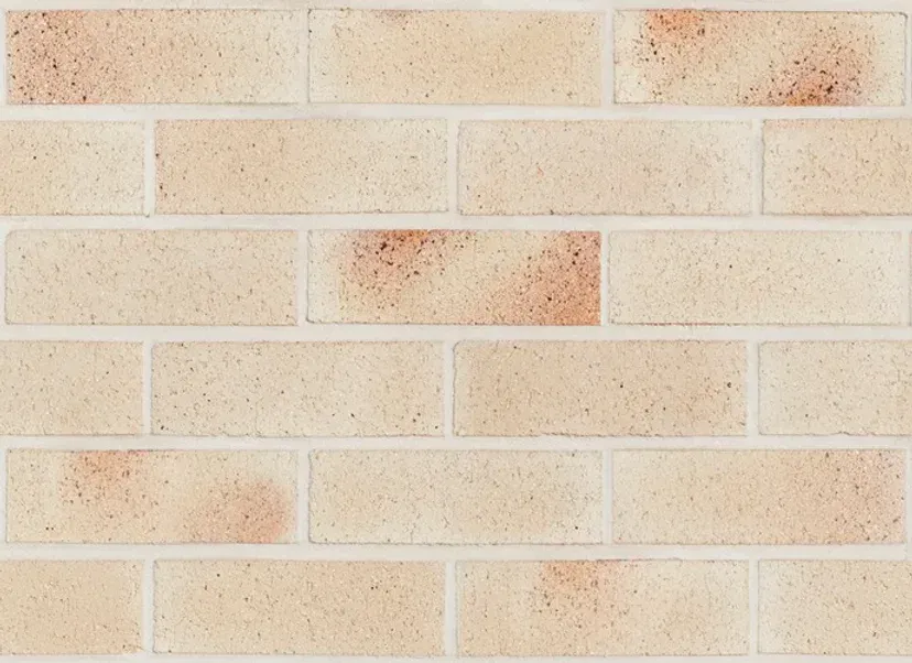 Close-up of a brick wall with tan and reddish-brown bricks — Premier Bricks, Blocks & Pavers In Heatherbrae, NSW