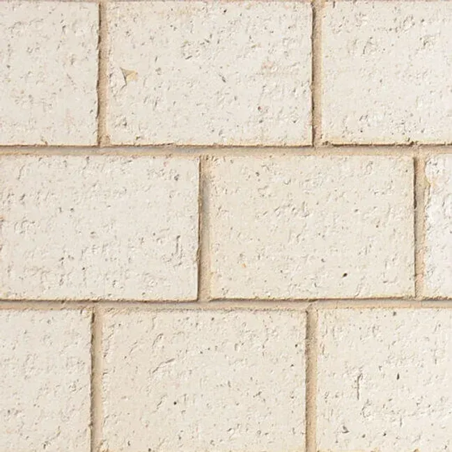 Off-white brick wall with rough texture and tan mortar joints — Premier Bricks, Blocks & Pavers In Heatherbrae, NSW