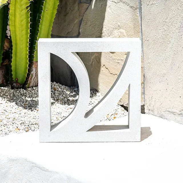 Concrete block with an abstract design cutout — Premier Bricks, Blocks & Pavers In Heatherbrae, NSW