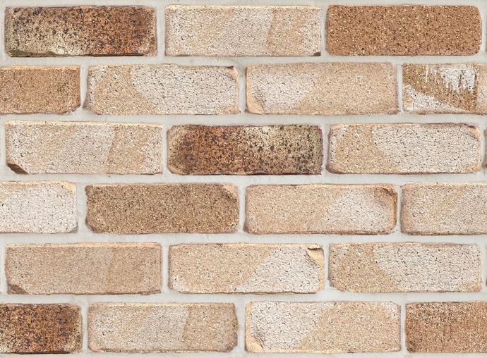 Brick wall with light beige mortar and varied brown bricks — Premier Bricks, Blocks & Pavers In Heatherbrae, NSW