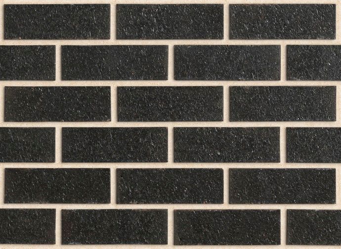 Black brick wall pattern with cream-colored grout — Premier Bricks, Blocks & Pavers In Heatherbrae, NSW
