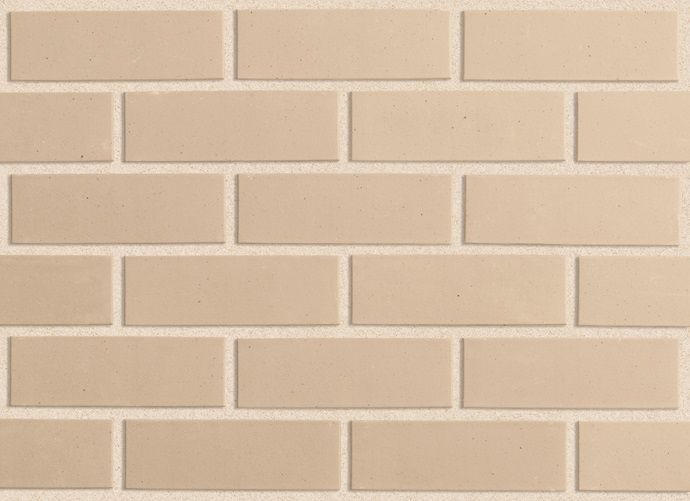 Light beige brick wall in a running bond pattern, with mortar lines — Premier Bricks, Blocks & Pavers In Heatherbrae, NSW