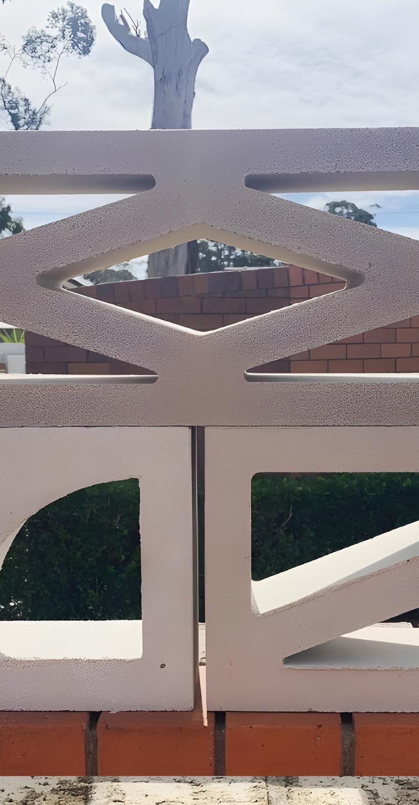 A White Fence With A Cactus In The Background — Premier Bricks, Blocks & Pavers In Newcastle, NSW