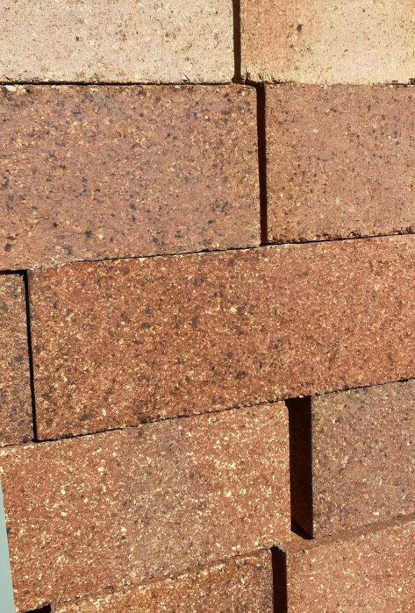 A Close Up Of A Brick Wall With A Lot Of Bricks — Premier Bricks, Blocks & Pavers In Port Stephens, NSW
