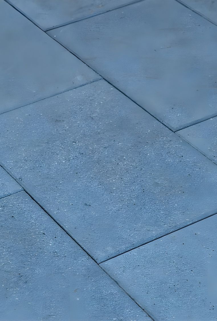 A Close Up Of A Blue Tile Floor — Premier Bricks, Blocks & Pavers In Lochinvar, NSW