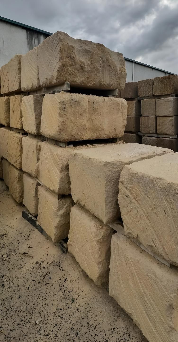 A Pile Of Sandstone Blocks Stacked On Top Of Each Other — Premier Bricks, Blocks & Pavers In Newcastle, NSW