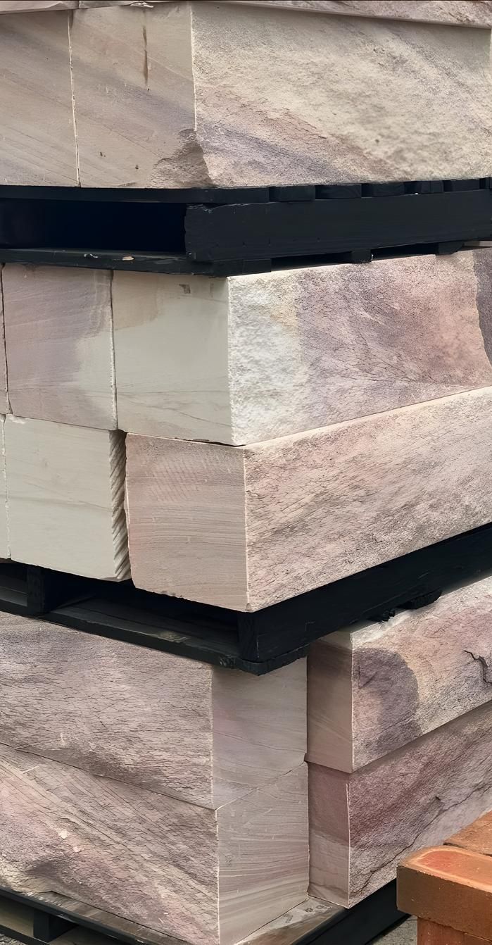 A Pile Of Bricks Stacked On Top Of Each Other On A Pallet — Premier Bricks, Blocks & Pavers In Port Stephens, NSW