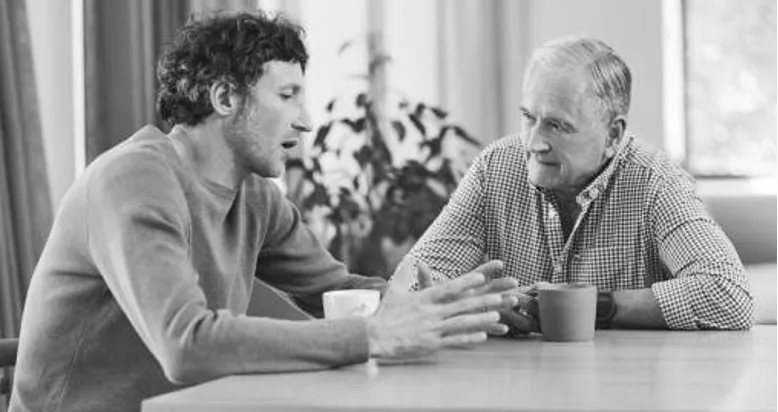Two Men Talking to Each Other
