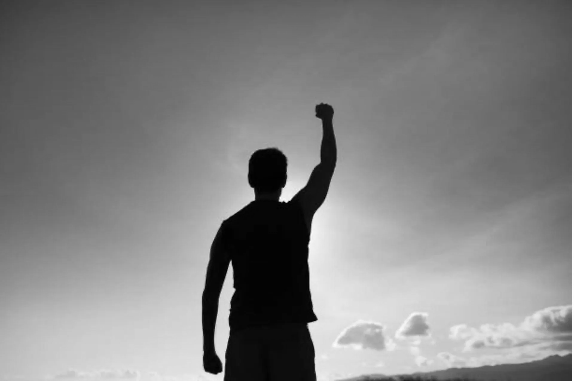 Man Holding His Right Hand High Man Holding His Right Hand High