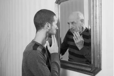 Man Looking at his Old Reflection Man Looking at his Old Reflection