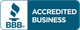 A blue sign that says accredited business on it