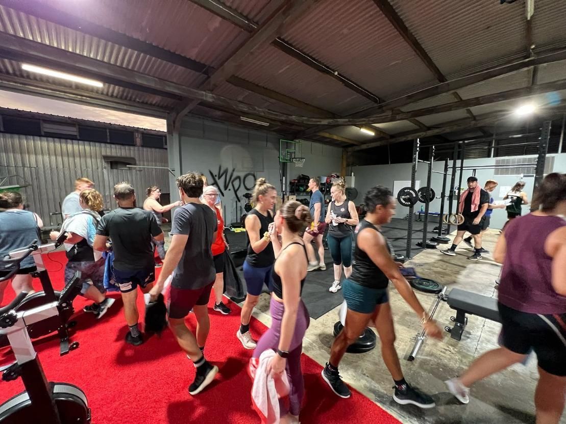 A Group Of People Are Standing In A Gym — Elev8ed Fitness In Currajong, QLD