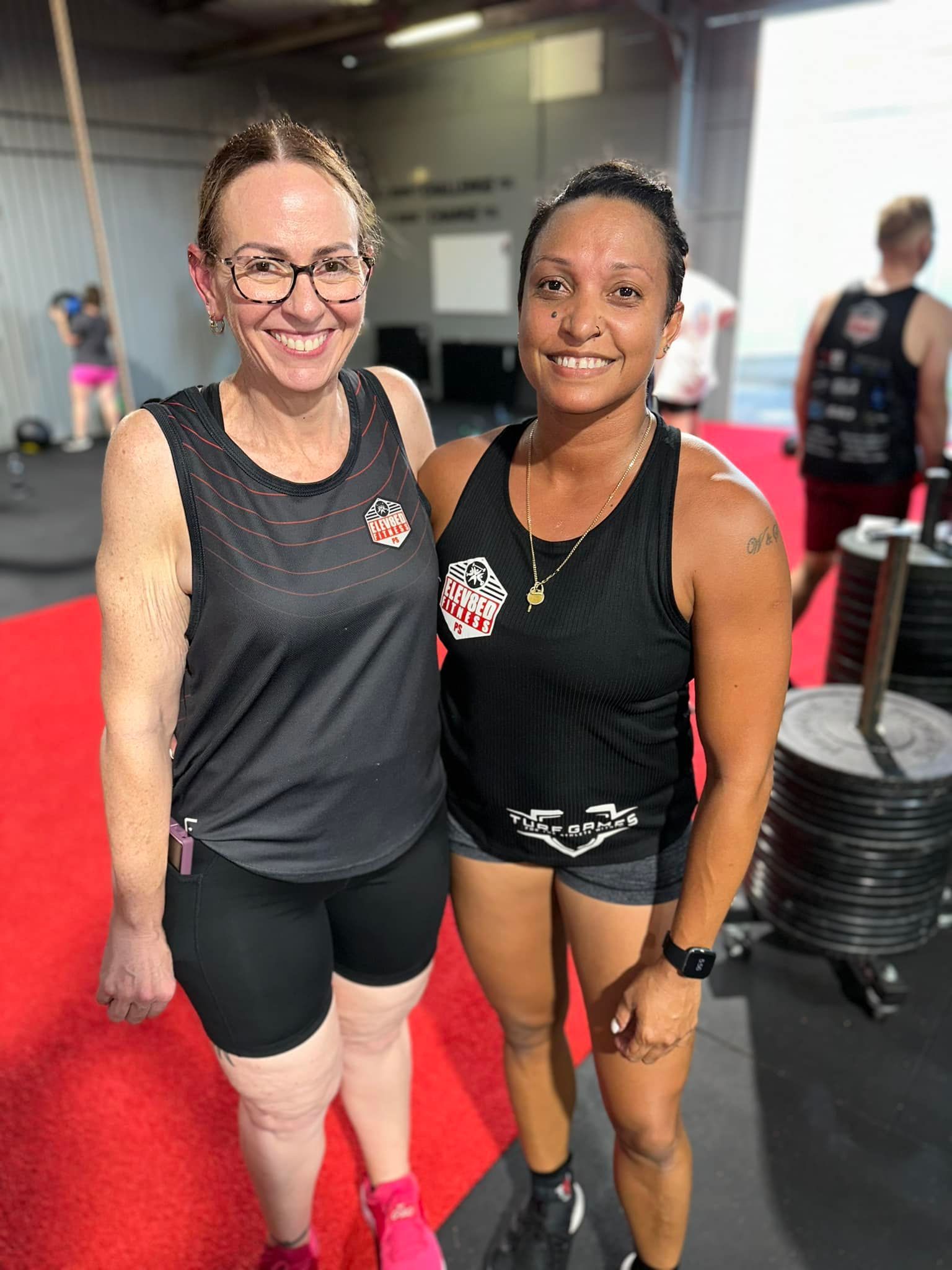 Two Women Are Posing For A Picture In A Gym — Elev8ed Fitness In Currajong, QLD