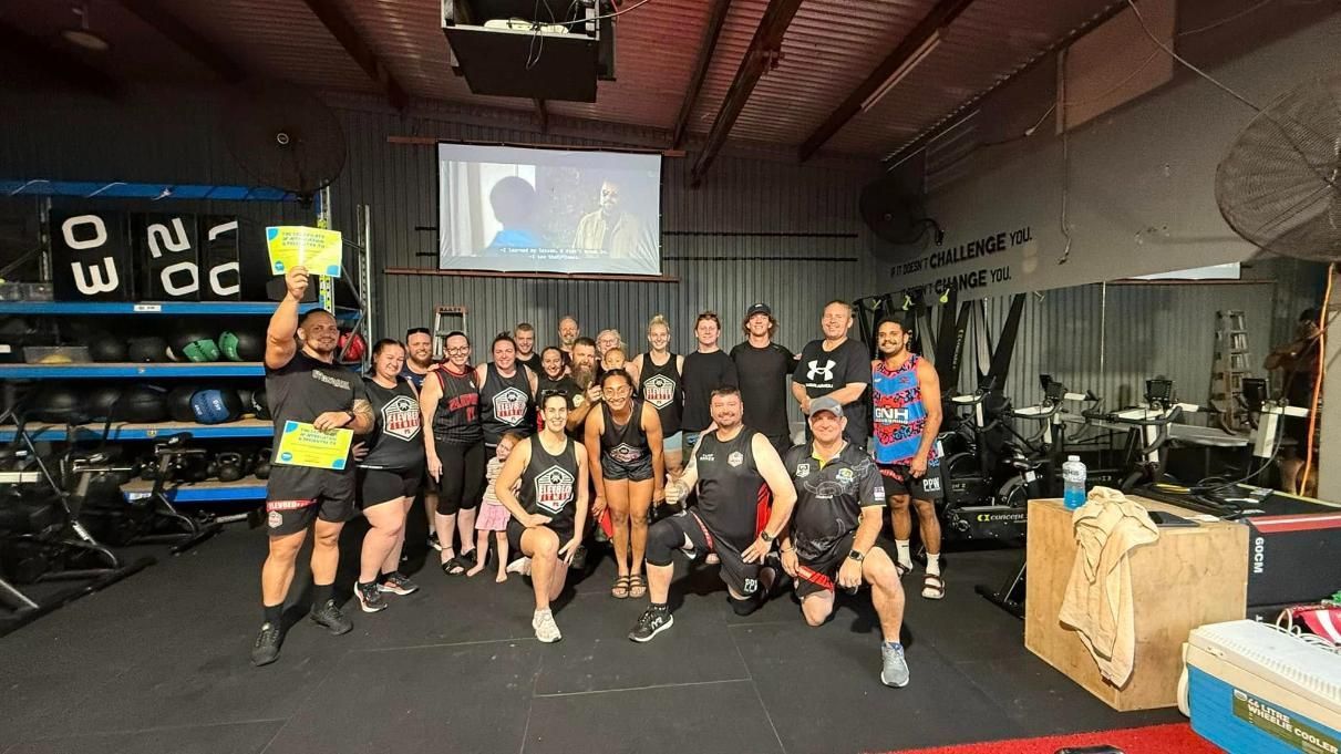 A Group Of People Are Posing For A Picture In The Gym — Elev8ed Fitness In Currajong, QLD