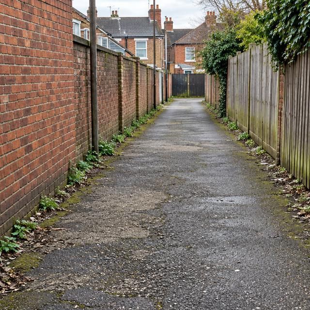After: the same alleyway clear from end to end