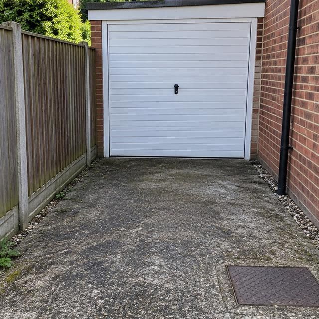 After: the same driveway clear
