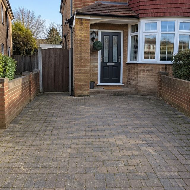 After: the same driveway cleared