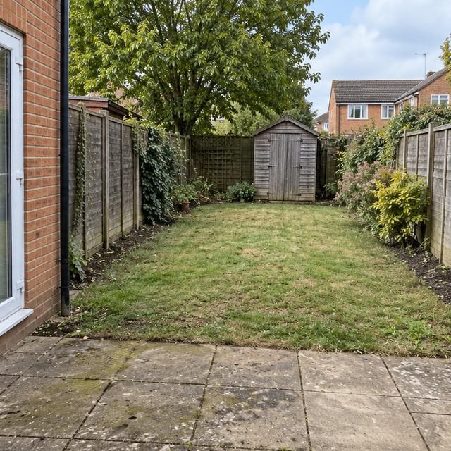 After: the same garden cleared back to the lawn