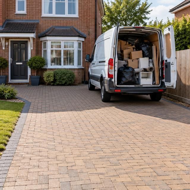 After: the same driveway clear with everything loaded