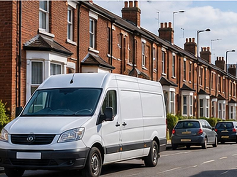 White van on a red-brick terraced street