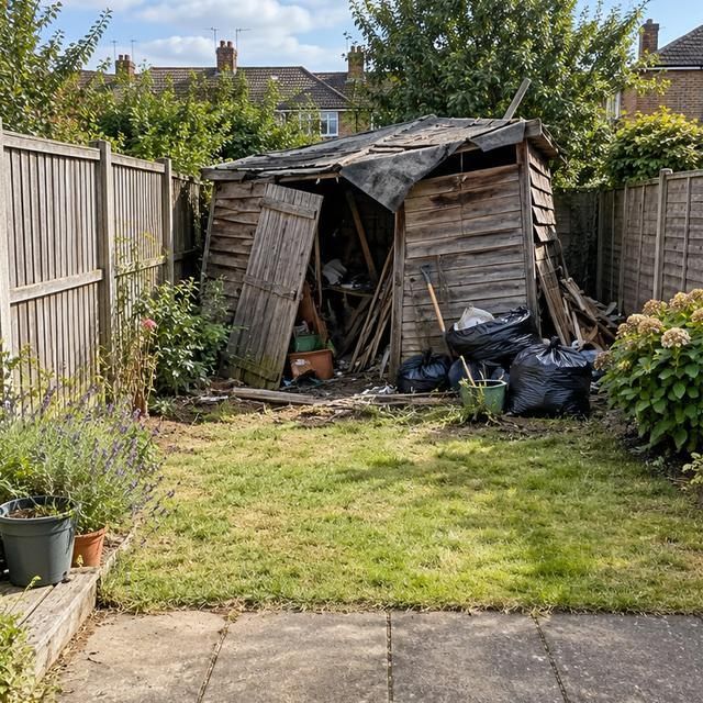 Before: a collapsed old shed at the end of a garden