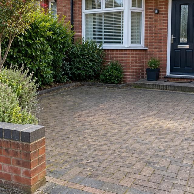 After: the same driveway clear