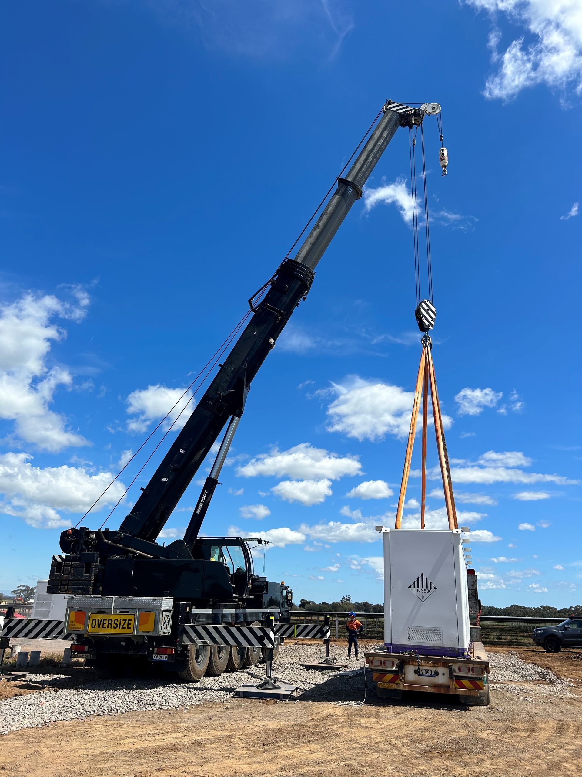 Image of Two Crane Truck Lifting Heavy Equipment — Shepparton, Vic — Moon Crane Hire