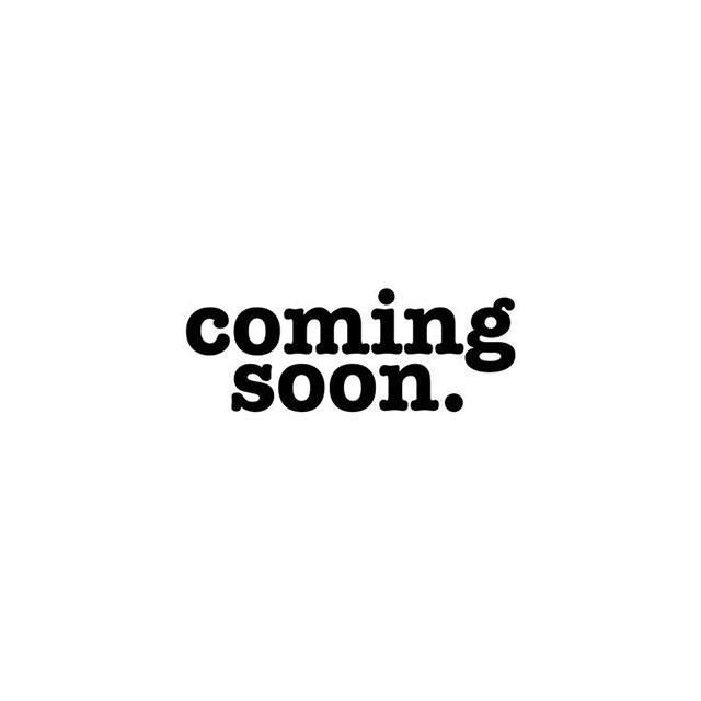 Black text reading “coming soon.” on a white background