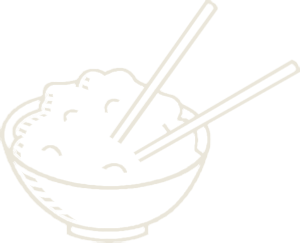 Bowl of rice with chopsticks.