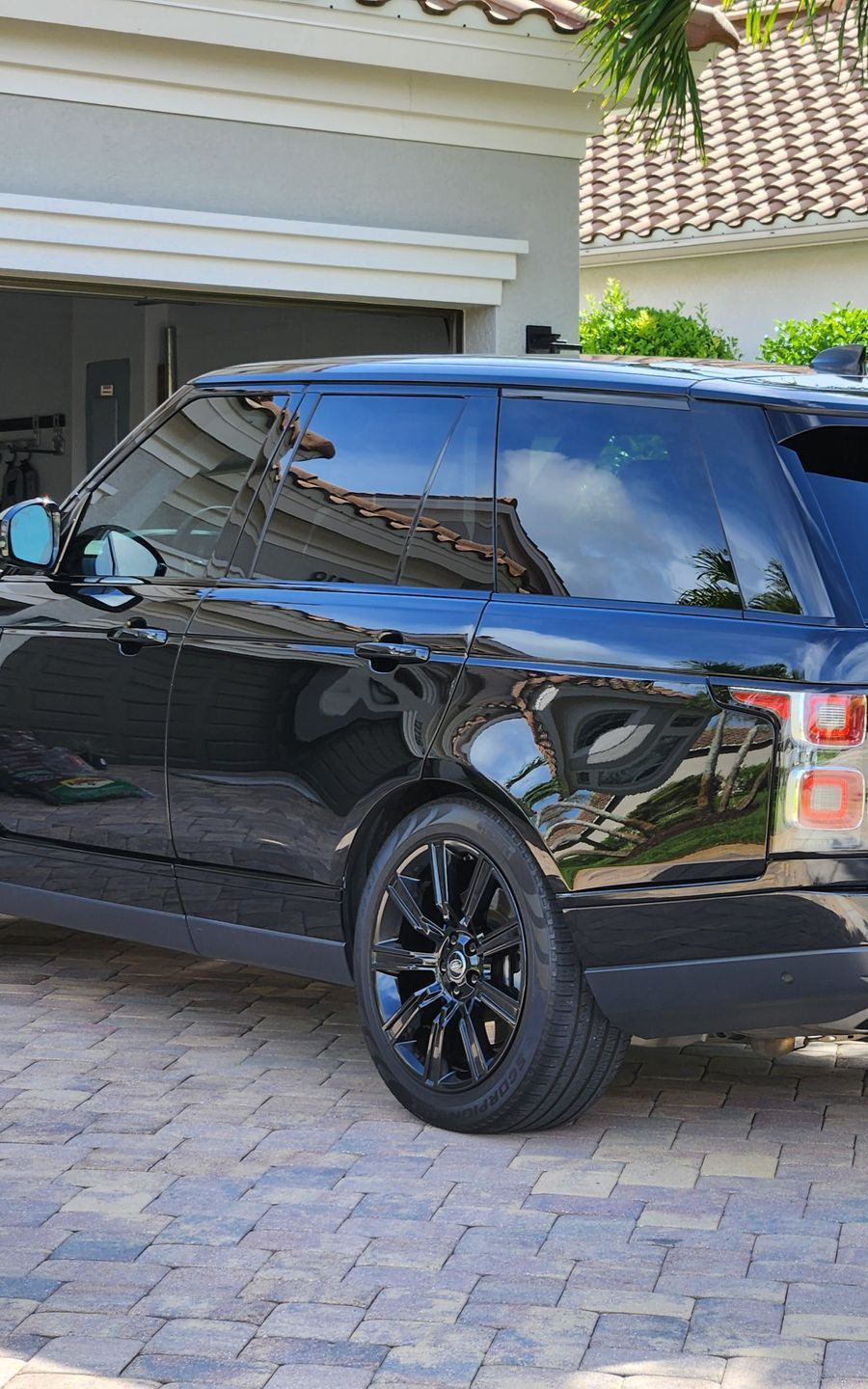 Land Rover Range Rover in Santorini Black, paint correction and ceramic coating by 6 Speed Mobile Detailing in Southwest Florida