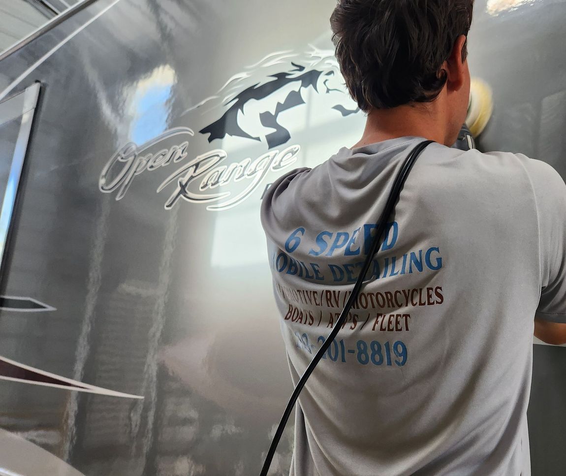 Open Range 5th Wheel RV receiving oxidation removal and ceramic coating by 6 Speed Mobile Detailing in Southwest Florida