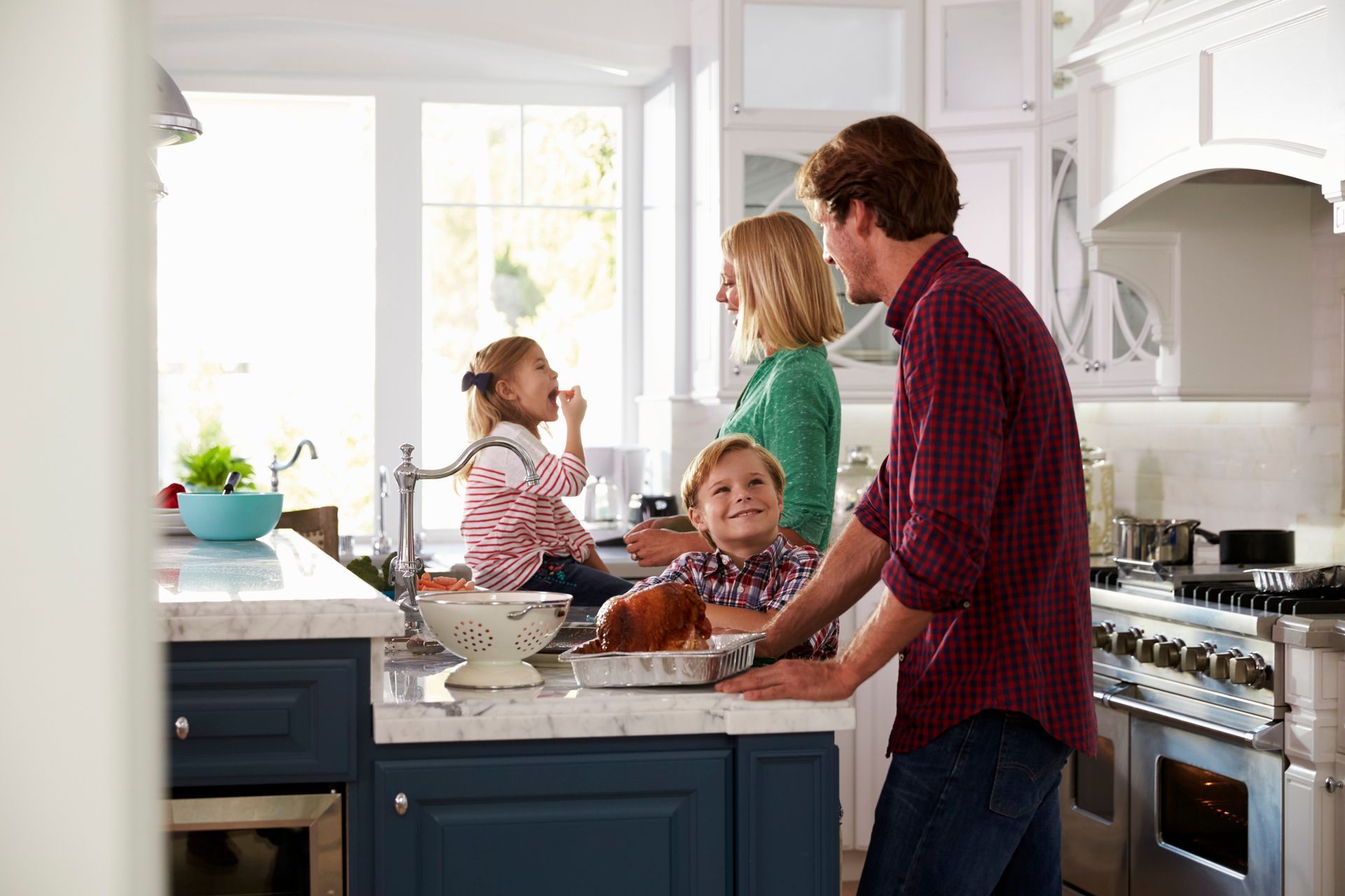Family preparing roast turkey - Johnson City, NY - OTHIS
