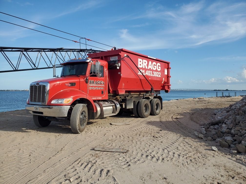 Dumpster Truck Servicing — Melbourne, FL — Braggs Roll-Off Dumpsters Inc.