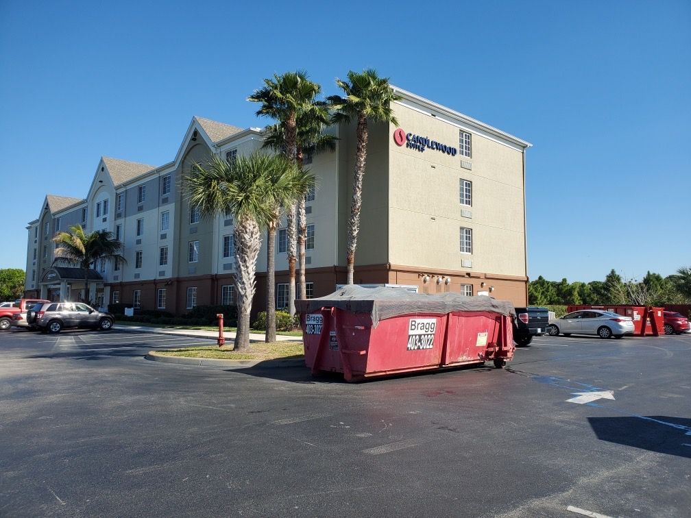 Filled Dumpster — Melbourne, FL — Braggs Roll-Off Dumpsters Inc.