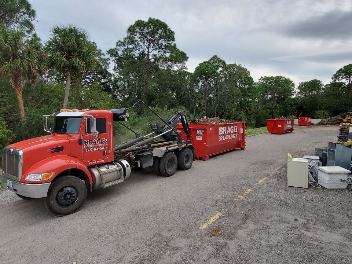 Bragg's Filled Dumpster — Melbourne, FL — Braggs Roll-Off Dumpsters Inc.