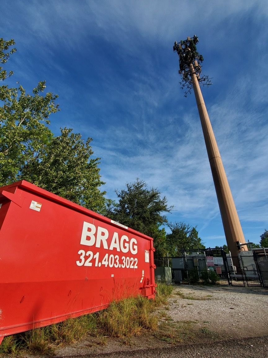 Bragg Dumpster — Melbourne, FL — Braggs Roll-Off Dumpsters Inc.
