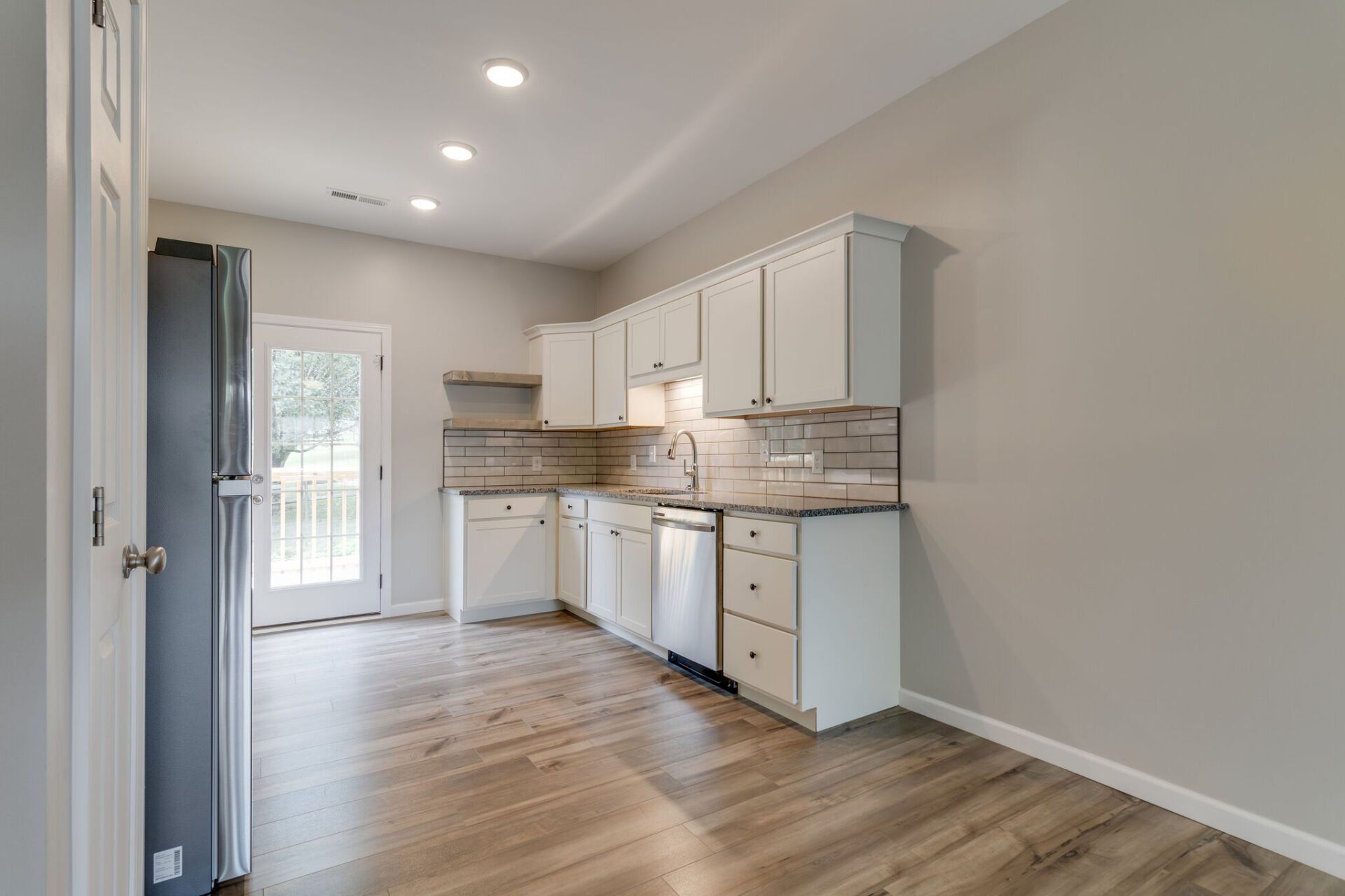 Kitchen with white cabinets